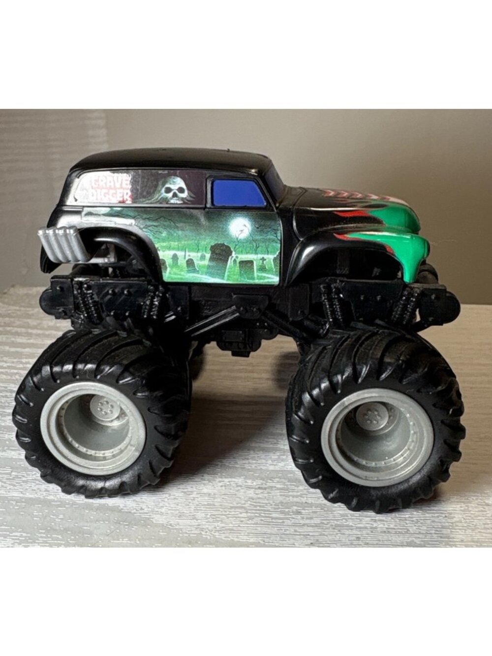 Grave Digger Monster Truck Toy With Oversized Tires & Graphic Details 4" x 3" - Picture 3 of 10